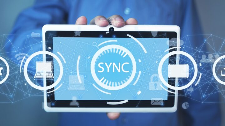A tablet shows device sync across a laptop and another screen