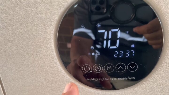 Pool heater control panel set to 70 degrees Fahrenheit
